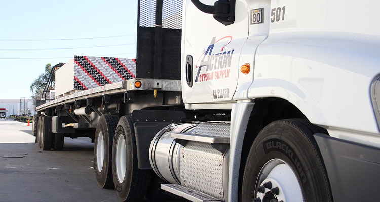 Action Gypsum Supply flatbed truck